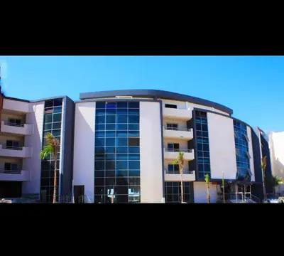 a large building with a lot of windows at Schöne Hotel -Apartment in Sky El Gandoul Hurghada in Hurghada