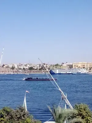 a boat in a large body of water at The Horizon House in Luxor