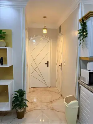 a door in a room with at Oscar Apartment 8 in Luxor