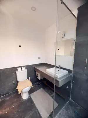 a bathroom with a toilet and a sink at Two Bedroom with Private pool in Hurghada