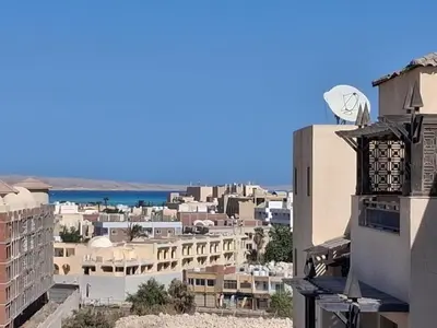 a view of a city from a building at Modern simple apartment with roof in Hurghada