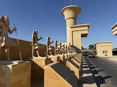 a monument with statues of women and a tower at studio in Hotel Gravity 5 stelle in Hurghada
