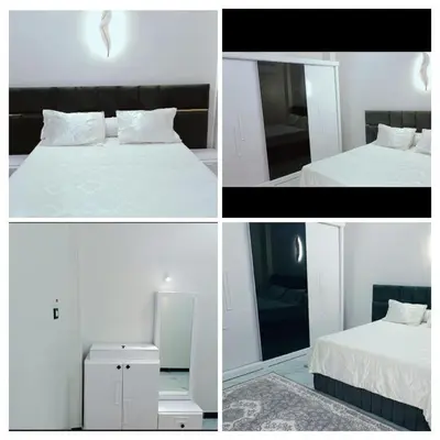 four images of a bedroom with a bed and a mirror at Flower House in Al Aqālitah