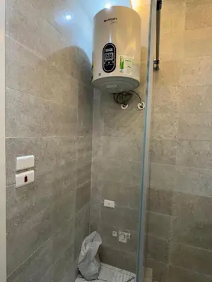 a bathroom with a shower with a toilet in it at 1st Time Rental, 2 BDR Apartment, Pool View, Intercontinental District in Hurghada