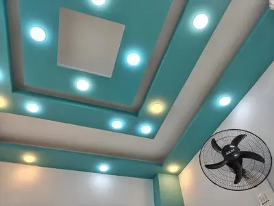 a room with a ceiling with a fan and a mirror at room 4 a room in Hostel of 4 rooms in Hurghada