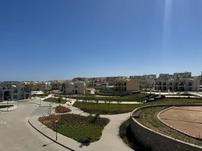 arial view of a park with buildings in the background at 3 bedrooms penthouse with sea view in Hurghada