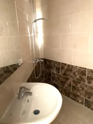 a bathroom with a sink and a shower at La prestigia Hurghada Apartment by Hurghada Concierge in Hurghada