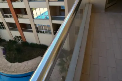 an escalator in a building with a building at Rivoli Suites in Hurghada
