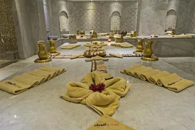 a group of gold items on a table in a mosque at Rivoli Suites in Hurghada