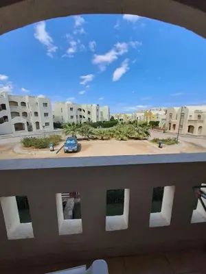 a view of a parking lot from a balcony at 2BR Makadi heights -cozy Flat in Hurghada
