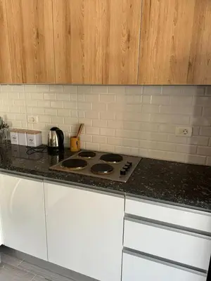 a kitchen counter top with a stove top oven at Bali - Elgouna Two Bedrooms private Heated pool in Hurghada