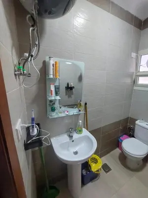 a bathroom with a sink and a toilet at Appartement for rent in Hurghada in Hurghada