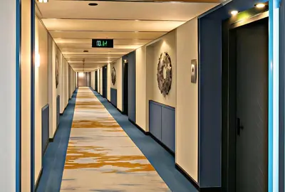 a corridor of a hospital hallway with a long aisle at Five-Star Deluxe River Kruz from Aswan to Luxor 3 Nights in Aswān