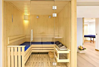 a sauna with a blue bench in a room at Five-Star Deluxe River Kruz from Aswan to Luxor 3 Nights in Aswān