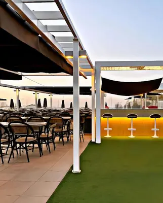 a group of tables and chairs on a roof at Five-Star Deluxe River Kruz from Aswan to Luxor 3 Nights in Aswān