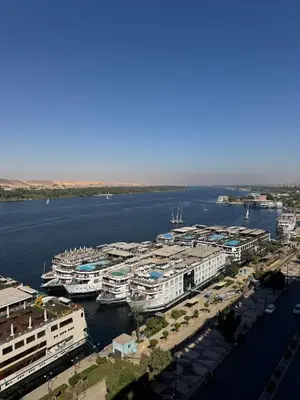 an aerial view of a harbor with boats in the water at King tut 7 in Aswān