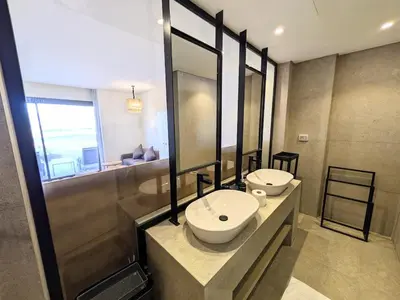 a bathroom with a sink and a mirror at Beachy Pool side Mesca Cabana Somabay Steps to Sea in Hurghada