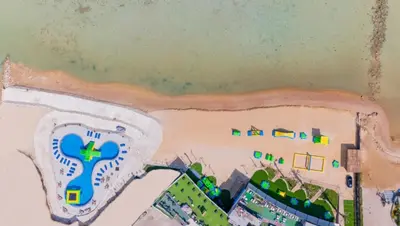a painting of a building with a cross on it at Aquatic Village - Red Sea Resort in Hurghada