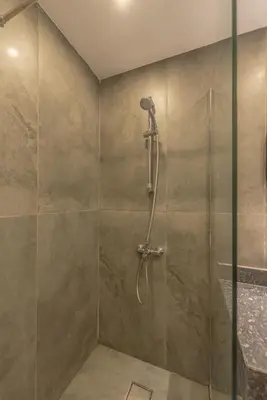 a bathroom with a shower with a glass door at Dreamy Studio in Bali Compound, El Gouna in Hurghada