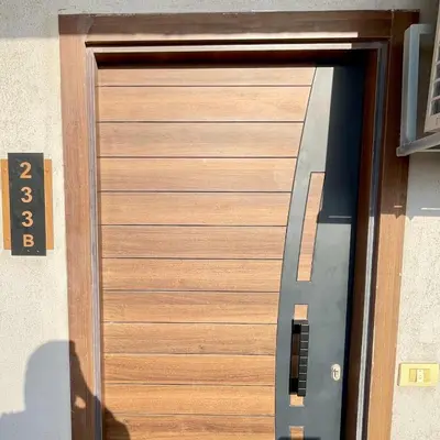 a wooden door on a building at Tiba Golden Resort Hurghada in Hurghada
