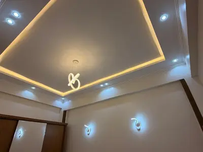 a room with a ceiling with a symbol on it at Omar Apartment in Luxor