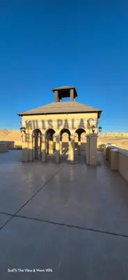a large building in the middle of the desert at Modern studio with sea view und large roof terrace in Hurghada