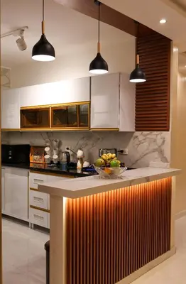 a kitchen with a counter with a bowl of fruit on it at Cozy Luxe Apartment in Central Aswan in Aswān