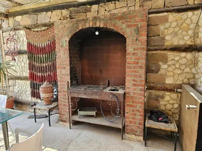 a brick oven with a sink in a brick wall at Silkes Villa in Hurghada