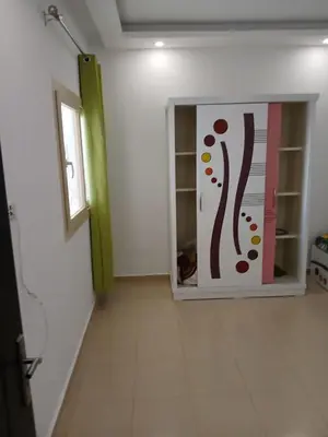 a room with a door with a painting on it at Chalets 980 in Mirage resort in Hurghada