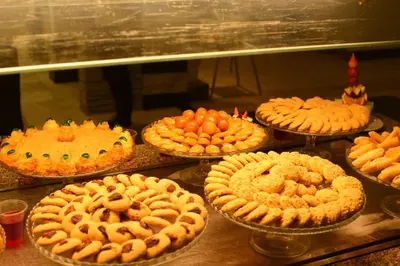 a bunch of pies sitting in a display case at Chalets 980 in Mirage resort in Hurghada