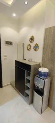 a bathroom with a counter and a sink in a room at Juliana Beach Resort Hurghada A105 in Hurghada