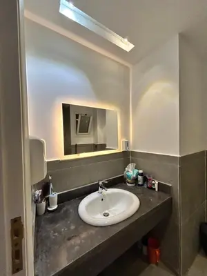 a bathroom with a sink and a mirror at El Saraya Resort Chalet, Sahl Hasheesh in Hurghada