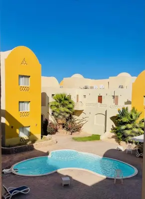 a view of the courtyard of a resort with a swimming pool at Casa Esmeralda in Hurghada