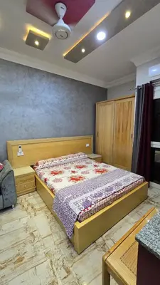 a bedroom with a bed in a room at Saint charbel in Hurghada
