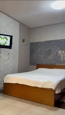 a bedroom with a bed in a room at katakitu in Hurghada