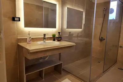 a bathroom with a sink and a shower at Luxury Red Sea Villa in Hurghada