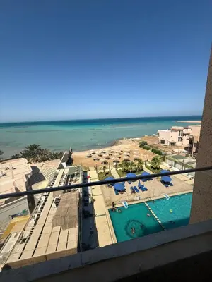a view of the beach from the balcony of a resort at Casablanca star hurghada in Hurghada