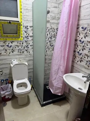 a bathroom with a toilet and a sink at Casablanca star hurghada in Hurghada