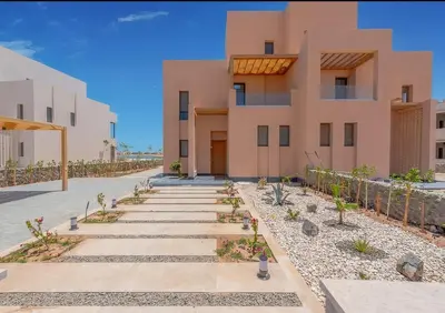 a house with a pathway in front of it at Ollystays Ancient Hill 4BR Villa Private Pool in Hurghada