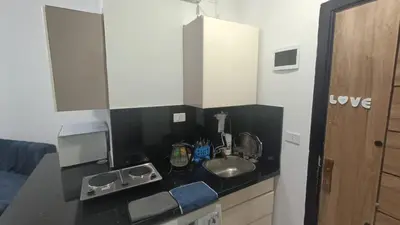 a kitchen with a sink and a counter top at Juliana beach resort in Hurghada