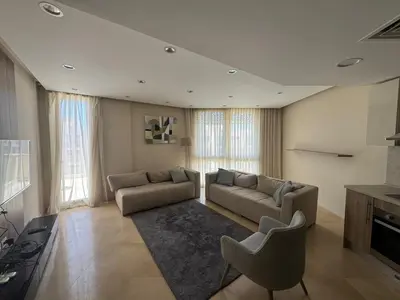 a living room with two couches and a rug at 3 Bdr Sea View with private roof Mangrovy EL Guna in Hurghada