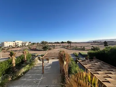 an empty amphitheater with a lot of tables and benches at Bohemian-Style 3BR Townhouse in Shedwan, El Gouna. in Hurghada