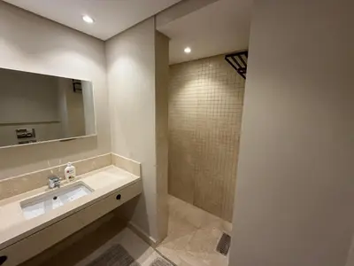 a bathroom with a sink and a shower at Cozy 1BR GF Mangroovy Residence in Hurghada
