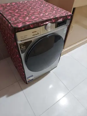a microwave oven sitting in a box on the floor at Hurghada Apartment with pool in Hurghada