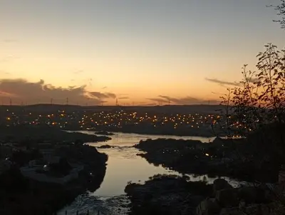 a view of a river at sunset at noreno guest house in Aswan