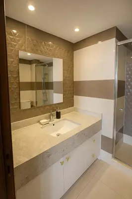 a bathroom with a sink and a shower at The View Hurghada Poolfront Sea View Apartment in Hurghada
