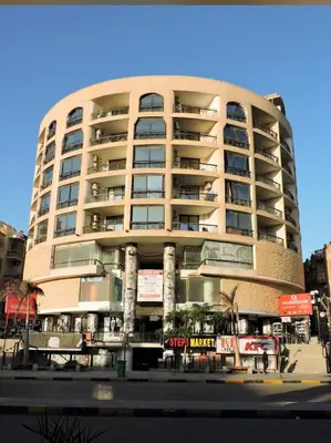a large building with balconies on the side of it at Bahia Hurghada - 2 Bedrooms Serviced Apartment - City view in Hurghada