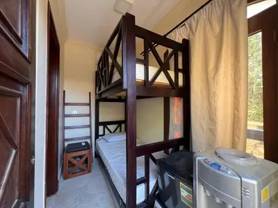 a room with two bunk beds in a room at Waterfront Sabina I 4Bdr Retreat - Heated Pool in Hurghada