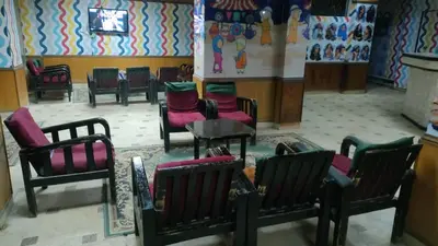 a group of chairs and tables in a waiting room at New mostafa hotel in Luxor
