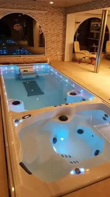 a jacuzzi tub in a room with at NG Trips in Hurghada
